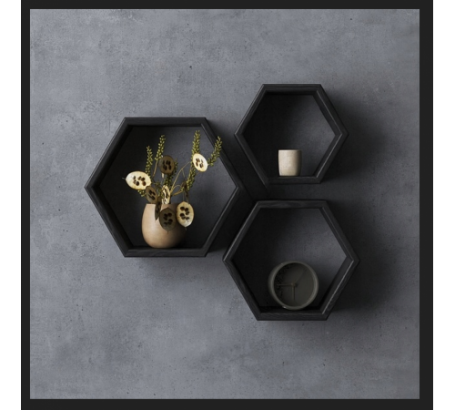 Набор трех шестигранных полок черного цвета.