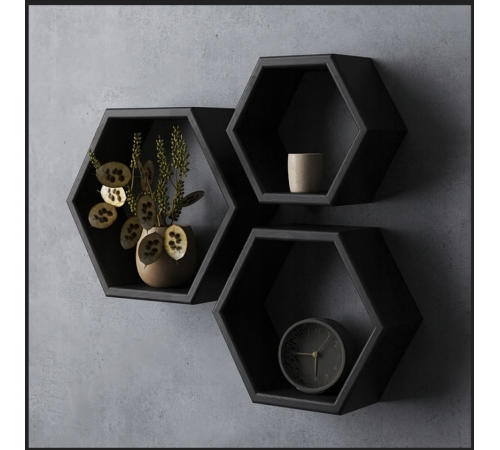 Набор трех шестигранных полок черного цвета.